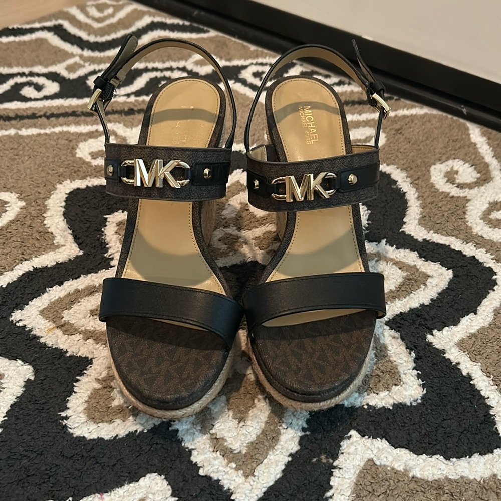 Michael Kors wedges size 8/12. Worn once. Great condition.